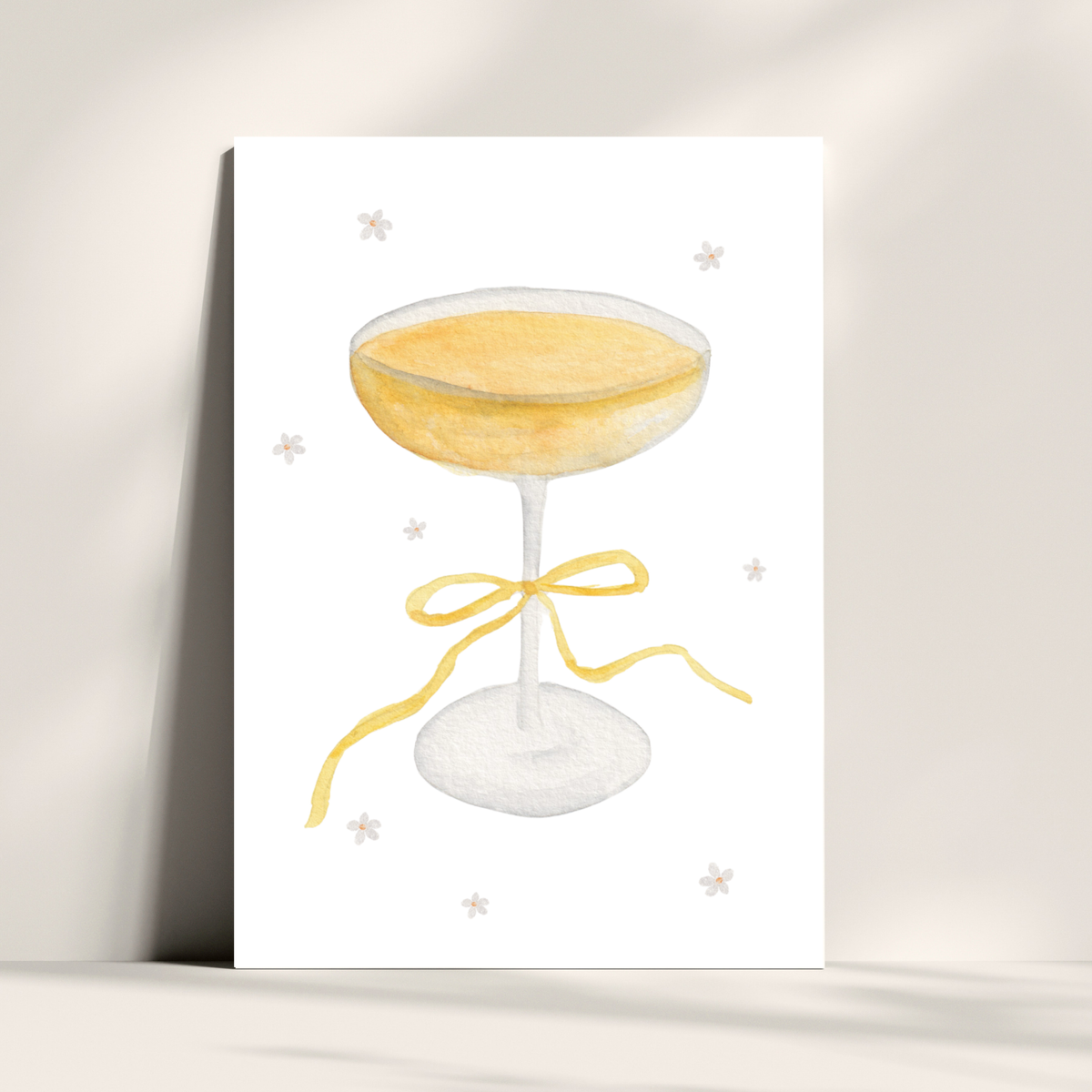 Glas mit gelber Schleife