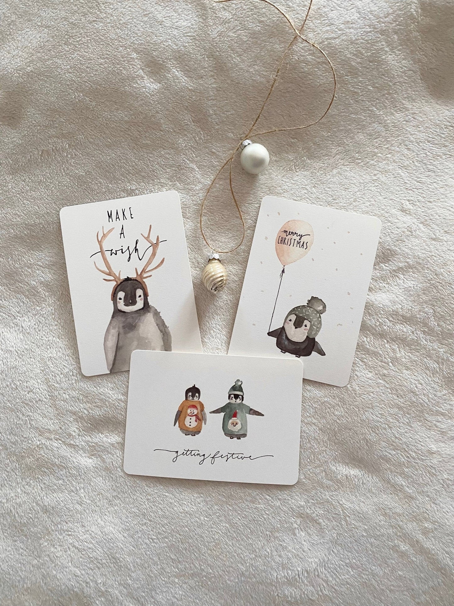 Weihnachtskarte Pinguin Ballon