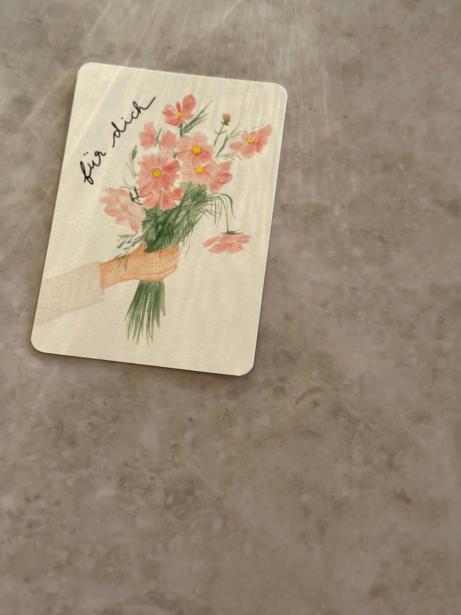 Karte Hand hält Blumen