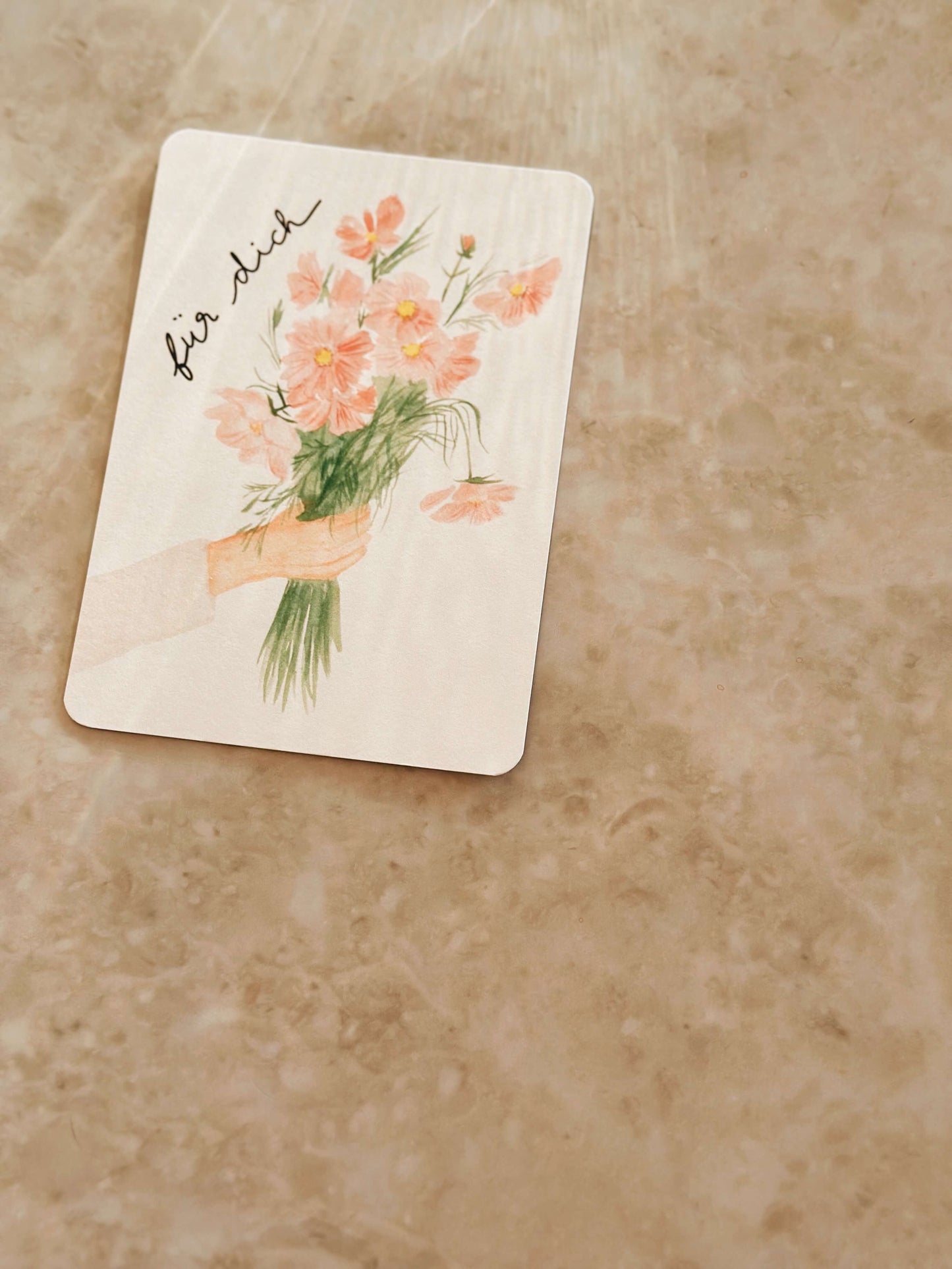 Karte Hand hält Blumen