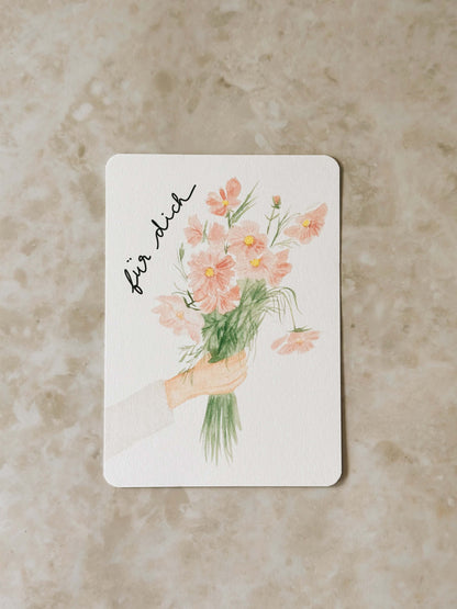 Karte Hand hält Blumen