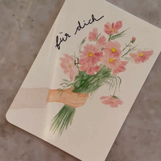 Karte Hand hält Blumen
