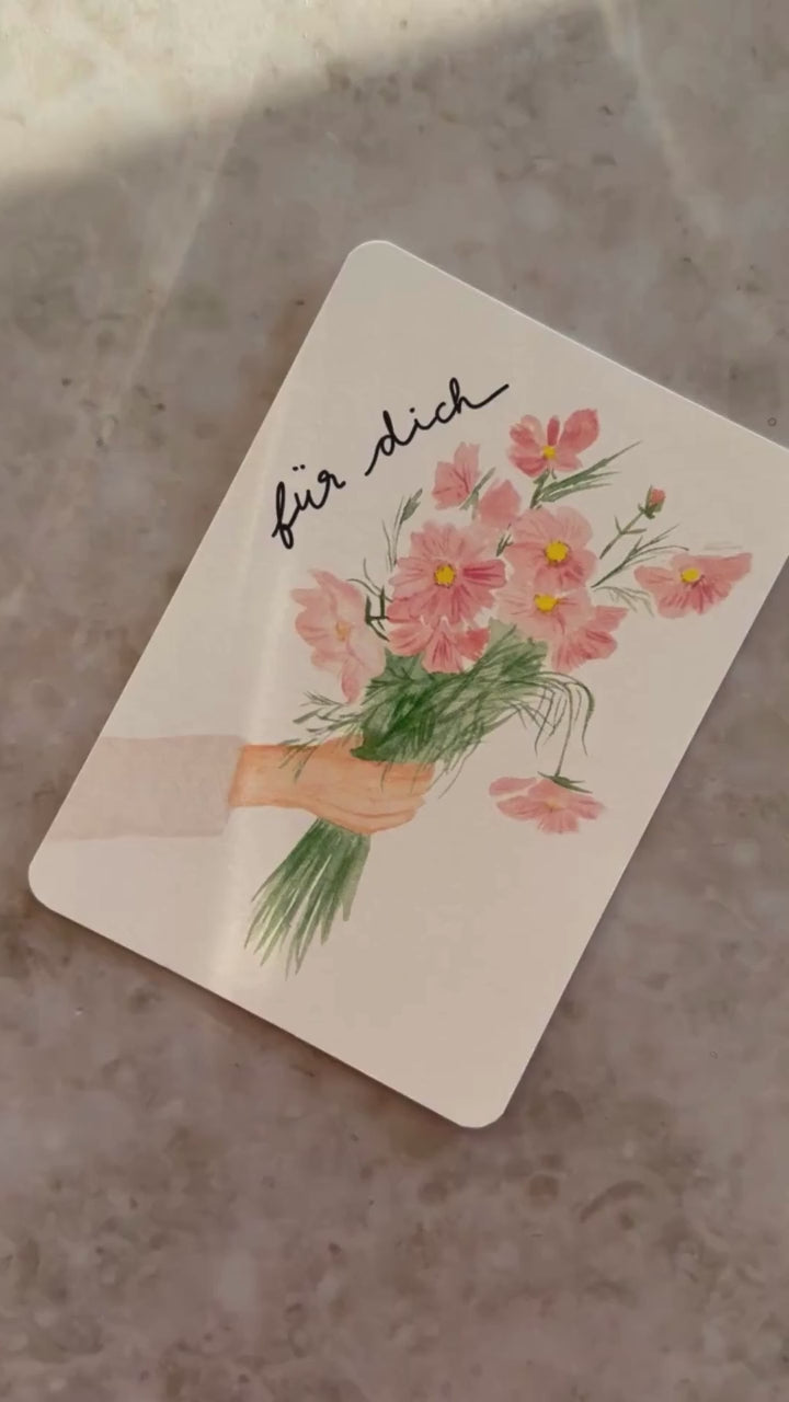 Karte Hand hält Blumen
